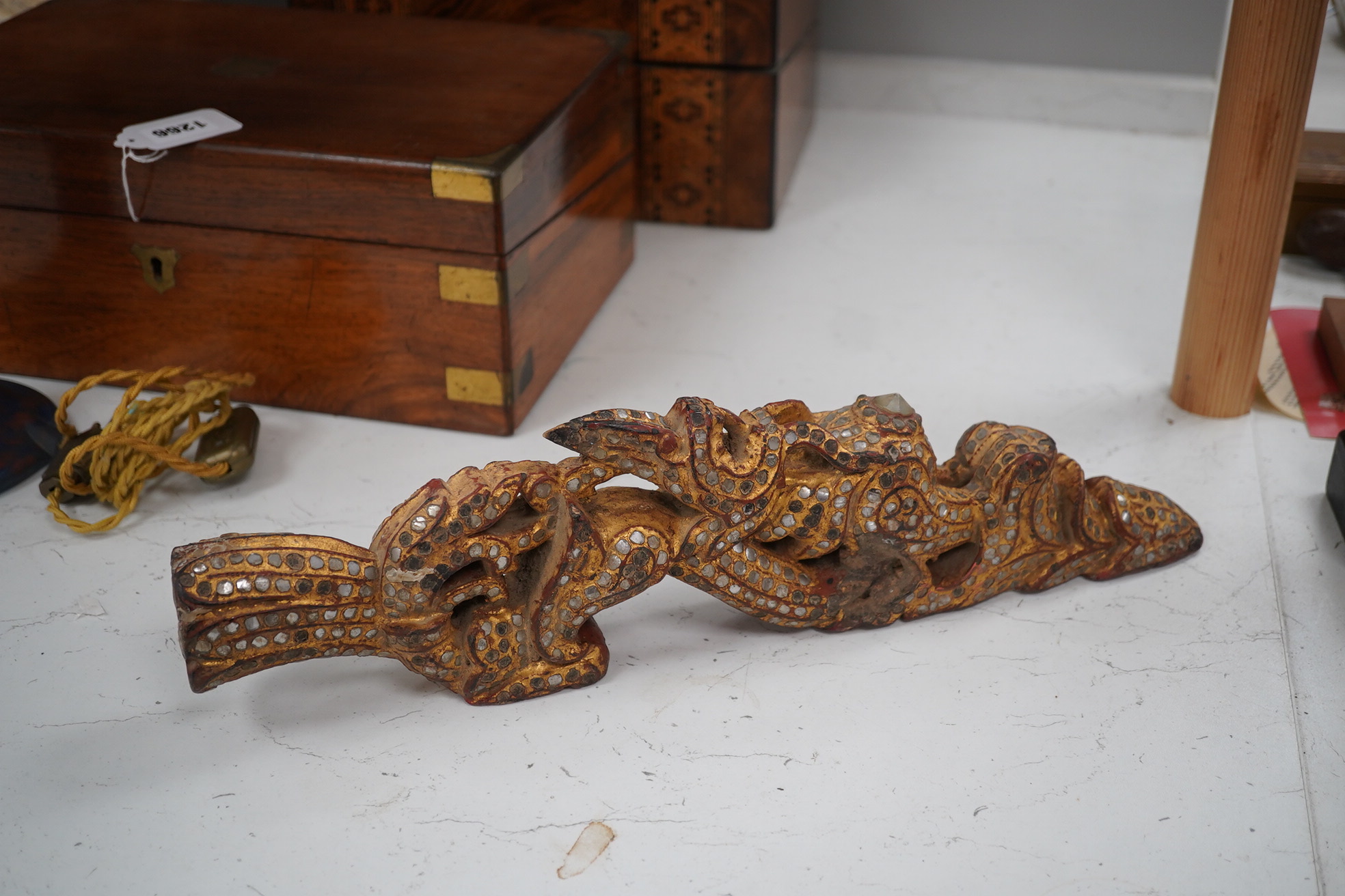 A group of African, Indonesian and other South East Asian carvings and a lacquer box. Sword 60cm long. Condition - poor, fair to good